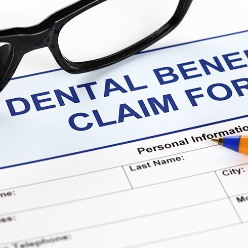 A closeup of a dental benefits claim form
