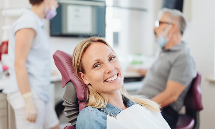 Woman with dental crowns in Jersey City