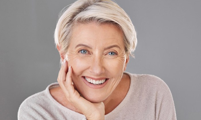 Beautiful older woman smiling with dentures in Jersey City