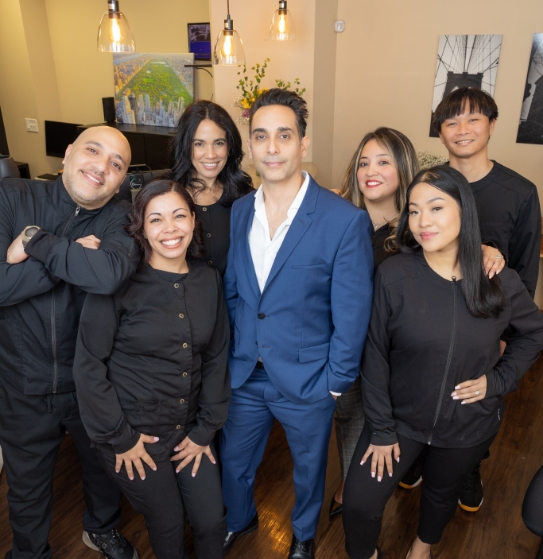 team of dentists smiling together