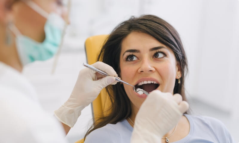 Woman receiving gum disease treatment in Jersey City New Jersey