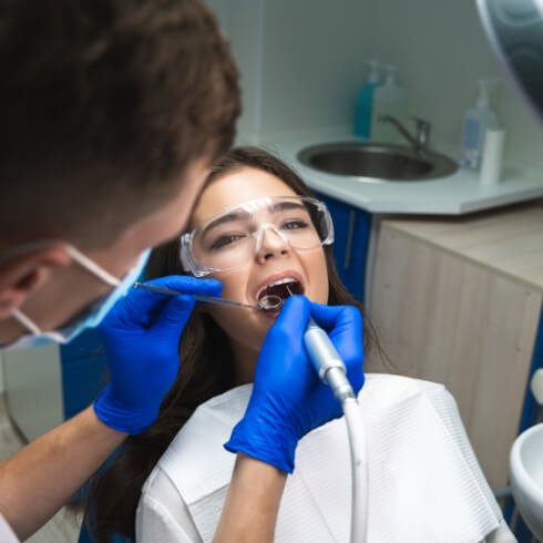 Dental patient receiving root canal therapy