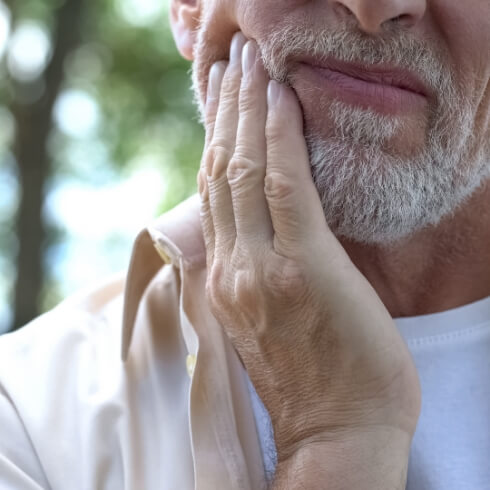 Man in pain before root canal therapy